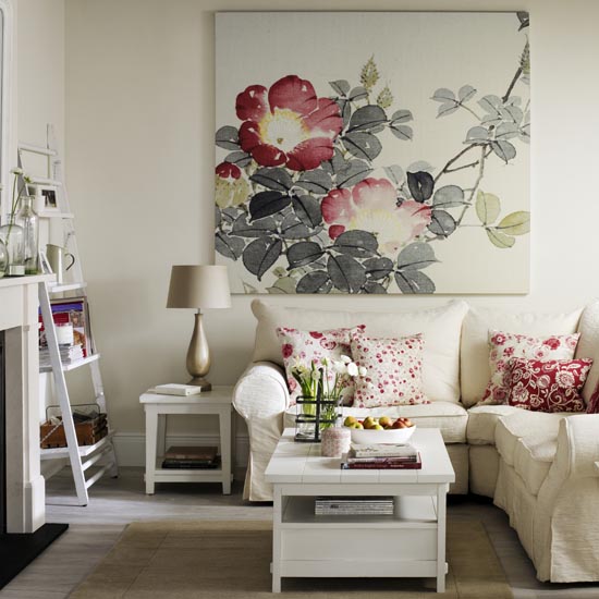 Vintage roses style white living room, white L shaped sofa with rose prited cushions, bold rose printed wall canvas, fireplace, IH 05/2014
