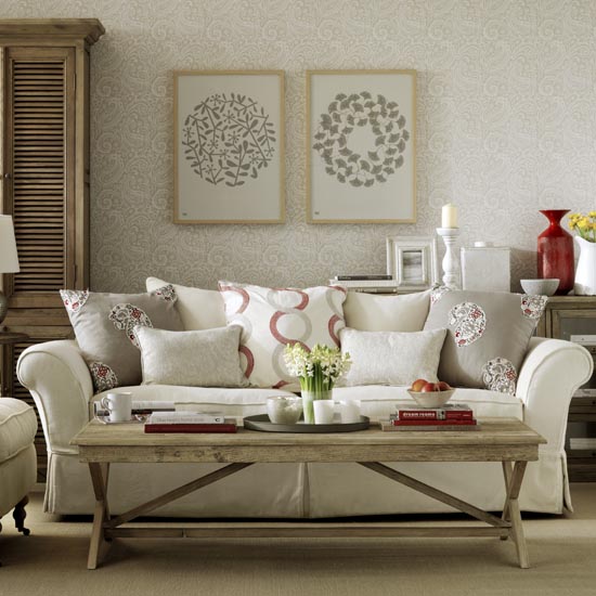 Chic country living room, traditional style, damask printed wallpaper, cream sofa and armchair on castors, IH 04/2014